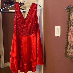 Dress never worn and is brand new! I never wore dress due to being too short.